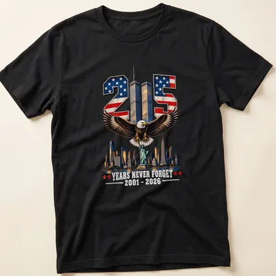 Vintage patriotic T-shirt featuring an eagle, Statue of Liberty, and skyline with commemorative text