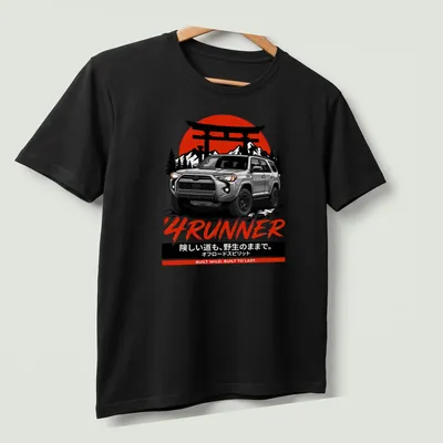 Retro Toyota 4Runner t-shirt with bold text in red, black, white, and gray — printed on a unisex t-shirt (angled view)