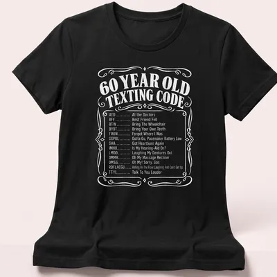 Vintage Texting Code t-shirt featuring humorous messaging about aging. — printed on a women's shirt