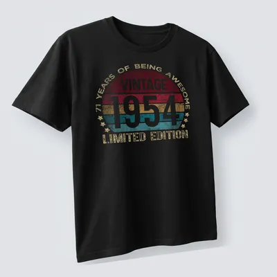 Vintage 1954 birthday t-shirt with colorful retro design celebrating 71 years — printed on a unisex t-shirt (angled view)