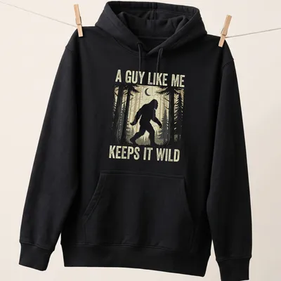 Vintage distressed Bigfoot graphic tee with humorous text about wild living — printed on a unisex hoodie