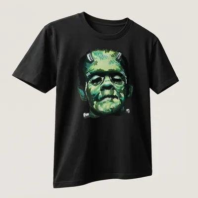Vintage illustration of Frankenstein's character head in green and gray — printed on a unisex t-shirt (angled view)