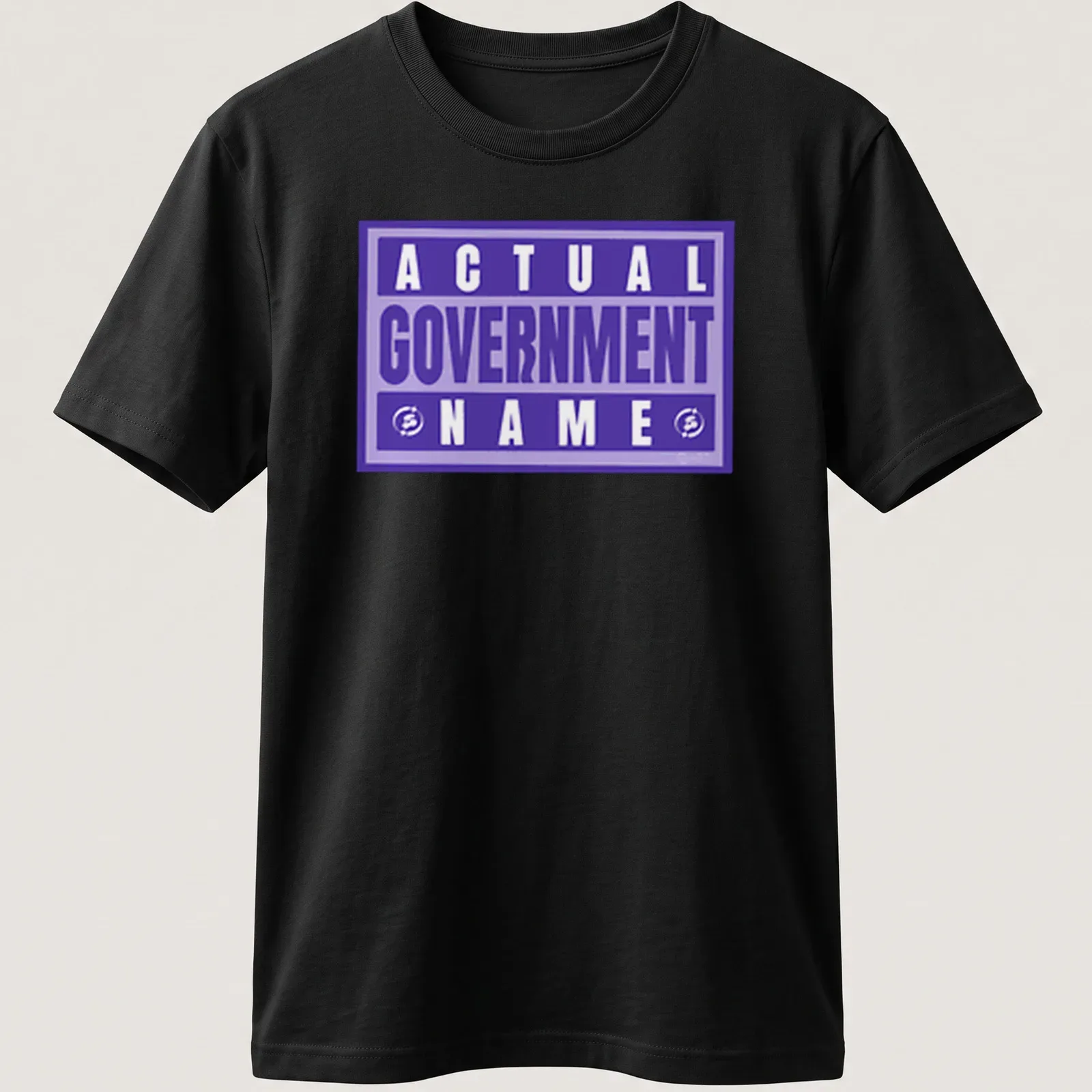 Bold typography t-shirt featuring 'Actual Government Name' in purple and white. — printed on a unisex t-shirt