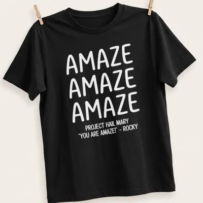Bold typography t-shirt featuring repeated text 'AMAZE' in white