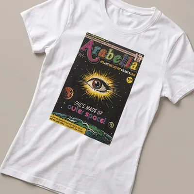Illustration of a cosmic eye with text about Arabella and outer space in vibrant comic book style. — printed on a women's shirt