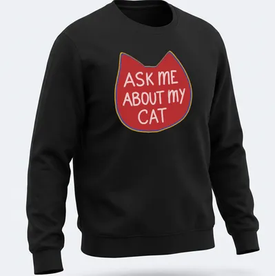 Playful illustration of a cat with the text ask me about my cat in red, white, and yellow — printed on a unisex sweatshirt
