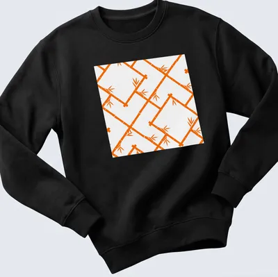 Modern chinoiserie bamboo lattice pattern in orange and white — printed on a unisex sweatshirt