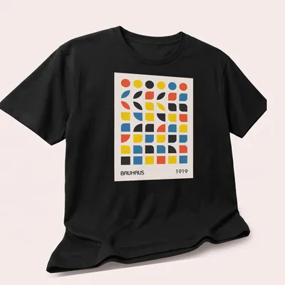 Minimalist shirt featuring geometric abstract design with Bauhaus 1919 text — printed on a unisex t-shirt (angled view)