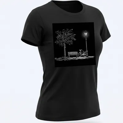 Minimalist black and white design featuring a bicycle, park bench, lamppost, and tree — printed on a women's shirt