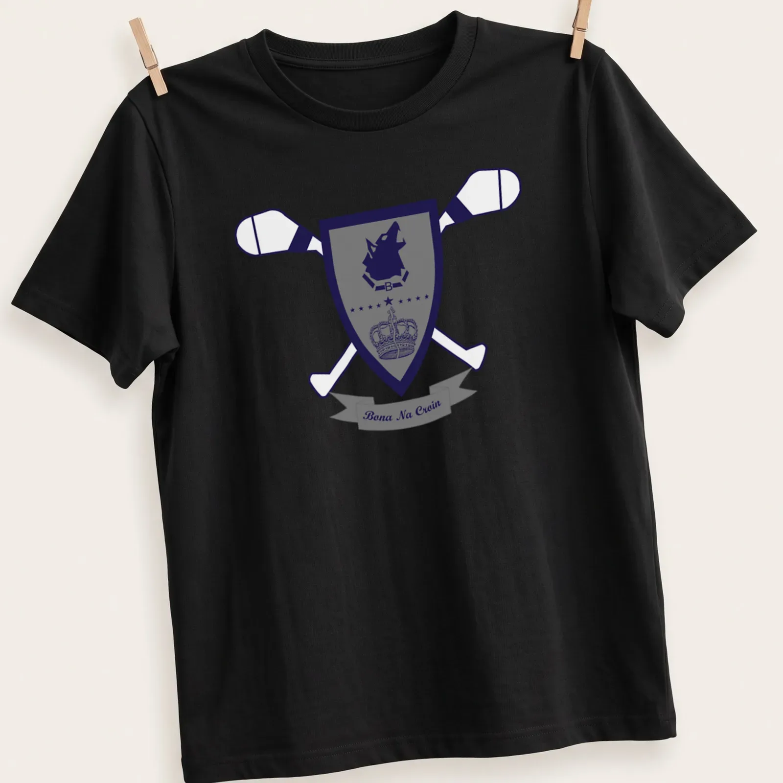 Shield design featuring a wolf crest emblem with navy blue, gray, and white colors — printed on a unisex t-shirt