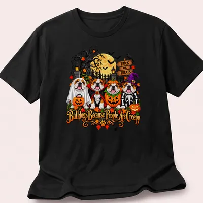 Colorful cartoon bulldogs in Halloween costumes with playful text — printed on a unisex t-shirt