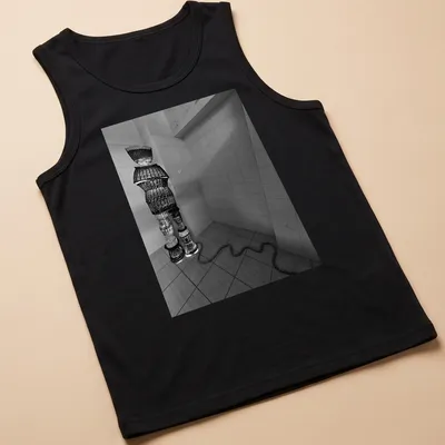 Black and white woven figure design representing winter travel. — printed on a tank top