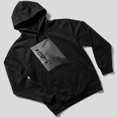 Black and white woven figure design representing winter travel. — printed on a unisex hoodie