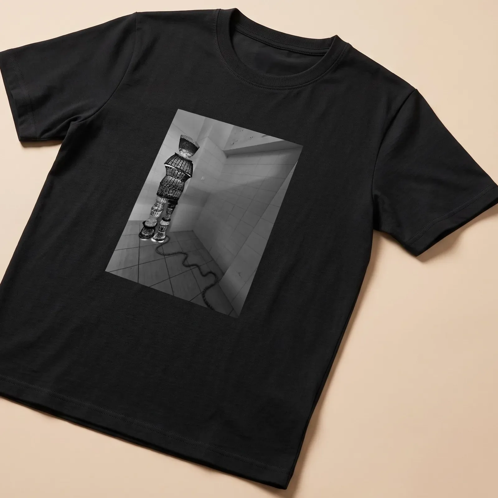 Black and white woven figure design representing winter travel. — printed on a unisex t-shirt