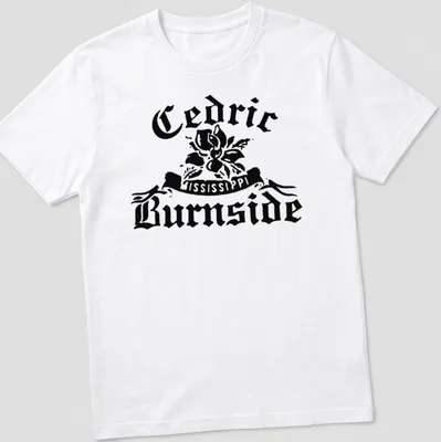 Bold vintage Cedric Burnside t-shirt featuring a magnolia flower and artistic text. — printed on a unisex t-shirt
