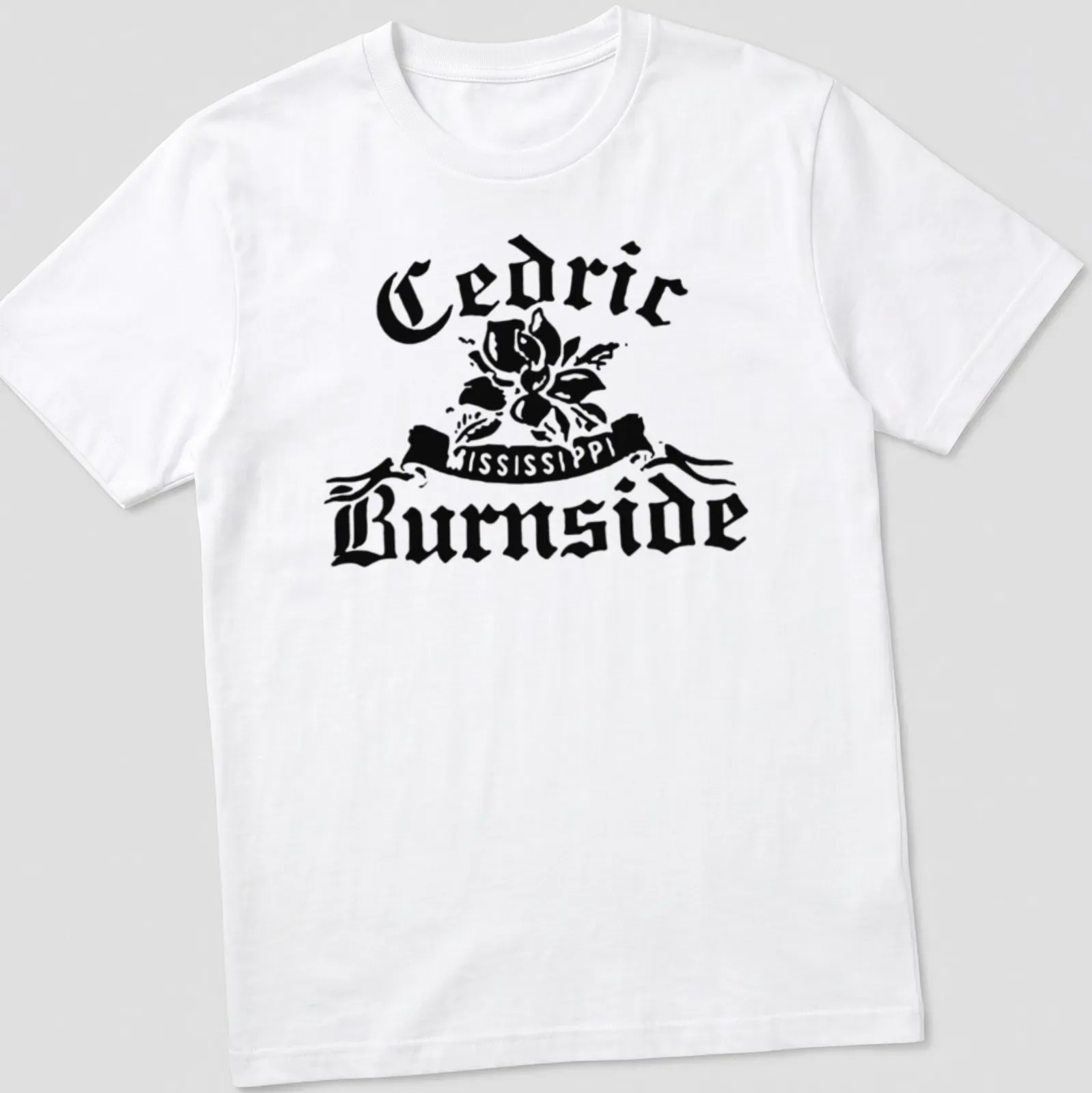 Bold vintage Cedric Burnside t-shirt featuring a magnolia flower and artistic text. — printed on a unisex t-shirt