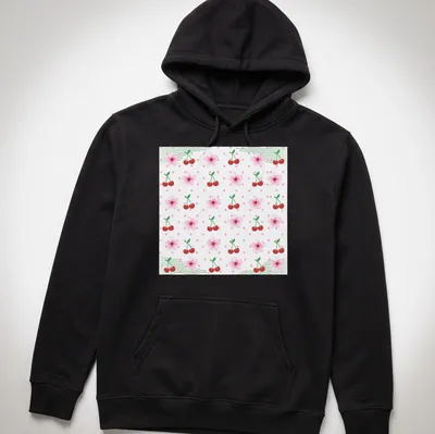 Floral pattern depicting cherries and cherry blossoms in pink, red, green, and white — printed on a unisex hoodie