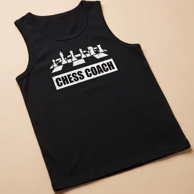 Bold Chess Coach t-shirt featuring chess pieces and simple typography — printed on a tank top