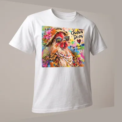 Colorful illustration of a chicken diva with the text 'Too Glam to Cluck' — printed on a unisex t-shirt (angled view)