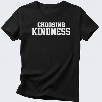 White t-shirt with bold text reading Choosing Kindness — printed on a women's shirt