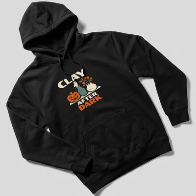 Retro design of a pumpkin and ghost with the text Clay After Dark for Halloween — printed on a unisex hoodie