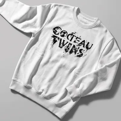 Artistic abstract design featuring 'COCTEAU TWINS' in black, white, and gray — printed on a unisex sweatshirt