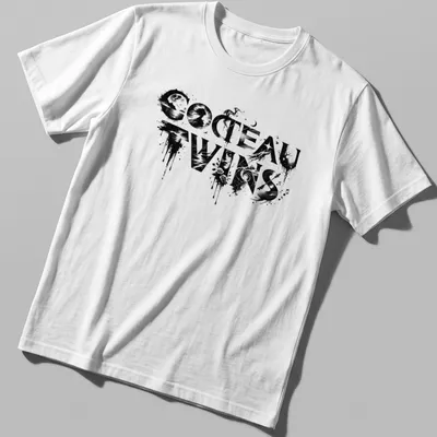 Artistic abstract design featuring 'COCTEAU TWINS' in black, white, and gray