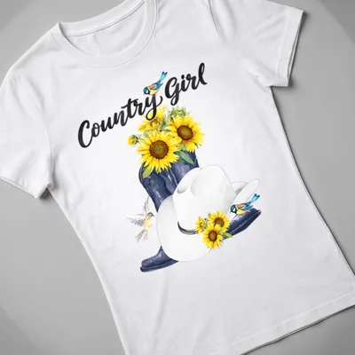 Whimsical watercolor print featuring cowboy boots, sunflowers, and birds with 'Country Girl' text. — printed on a women's shirt