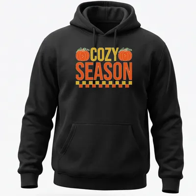 Vintage pumpkin design with the text COZY SEASON in warm autumn colors — printed on a unisex hoodie