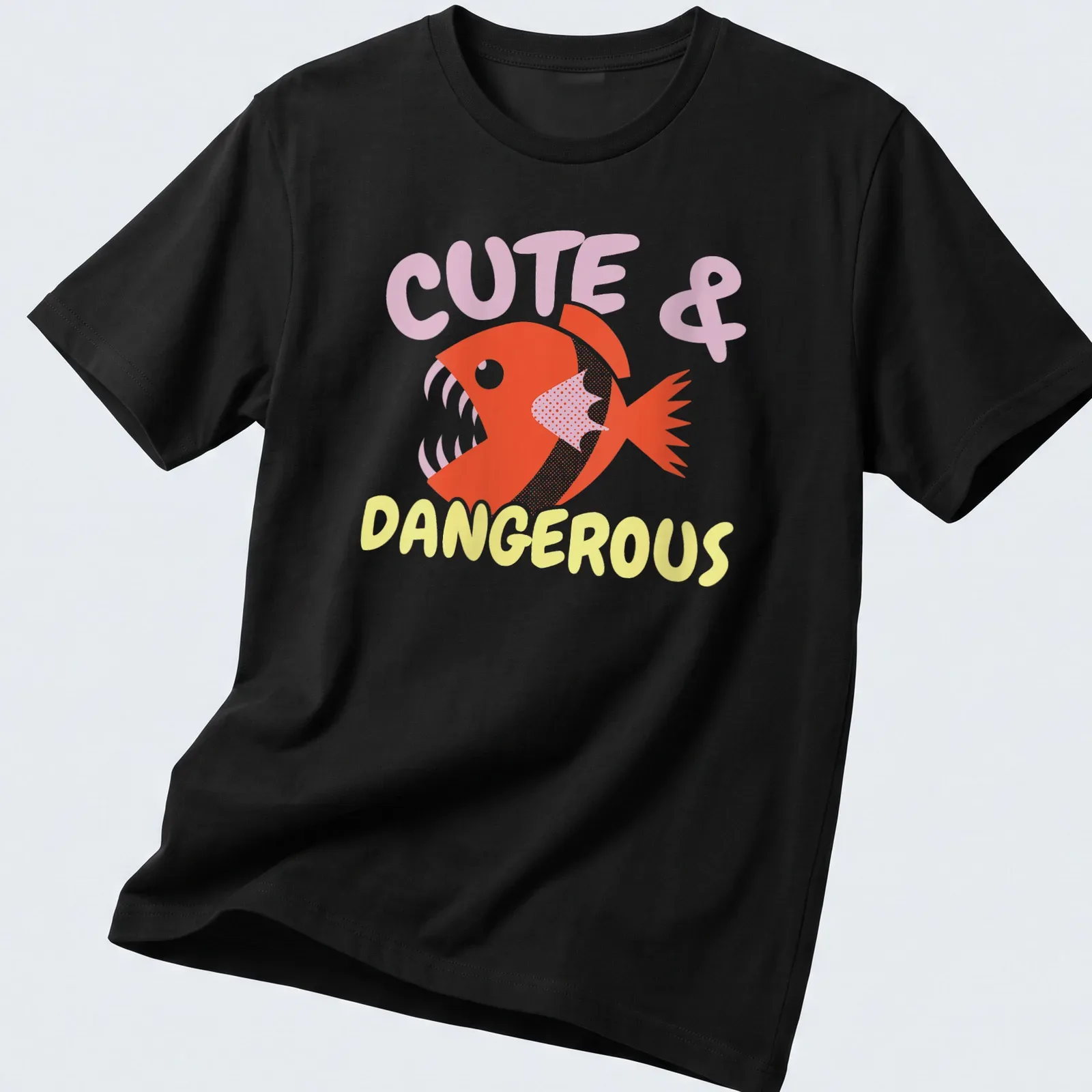 Playful cartoon piranha with vibrant colors and text Cute & Dangerous above it. — printed on a unisex t-shirt