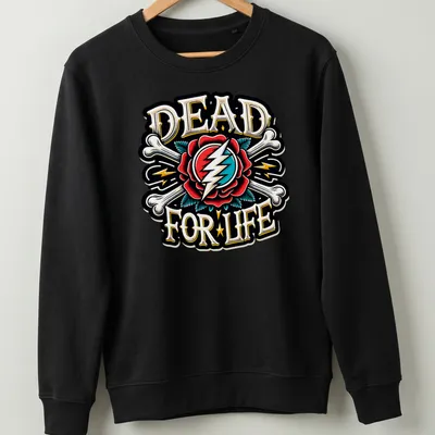 Vintage tattoo style design of a skull with a rose and lightning bolt, printed in bold colors. — printed on a unisex sweatshirt