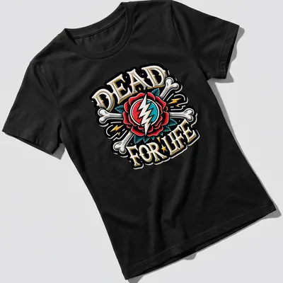 Vintage tattoo style design of a skull with a rose and lightning bolt, printed in bold colors. — printed on a women's shirt