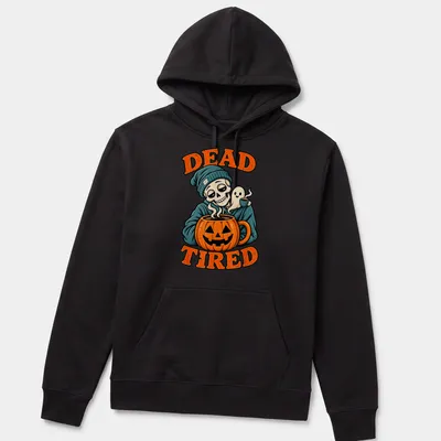 Vintage cartoon of a skeleton with ghost and pumpkin coffee mug alongside the text 'Dead Tired' — printed on a unisex hoodie