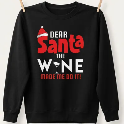 Playful Christmas shirt with text and graphics of a wine glass and Santa hat — printed on a unisex sweatshirt