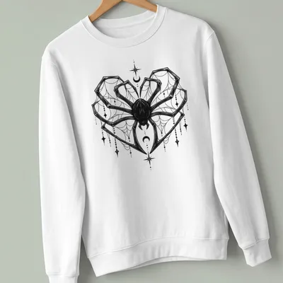Black line art of a spider in a heart shape with celestial elements — printed on a unisex sweatshirt