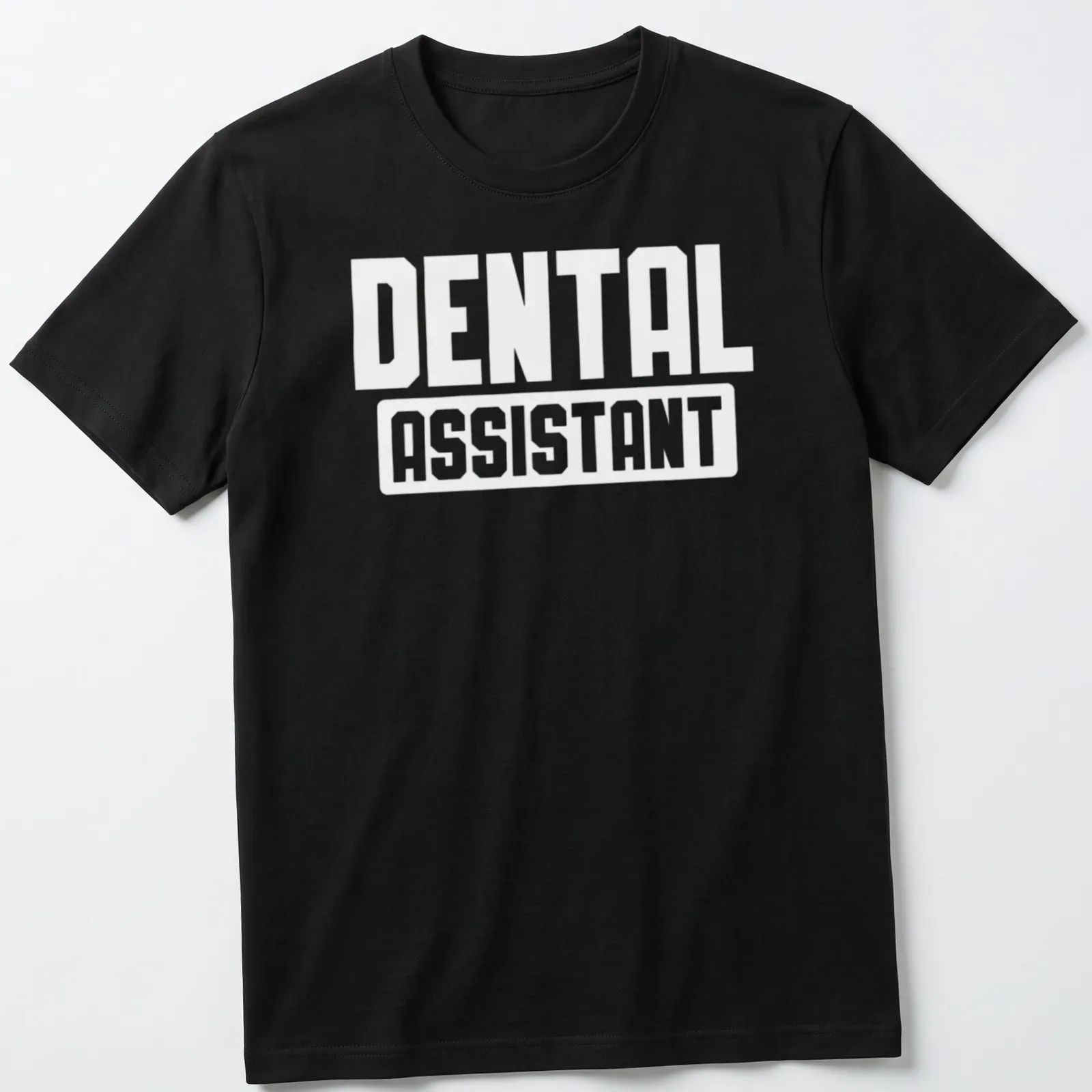 Bold typography tee with the words Dental Assistant in white lettering — printed on a unisex t-shirt