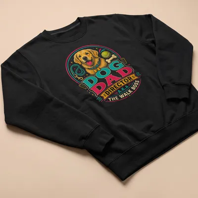 Vintage colorful Dog Dad t-shirt with a golden retriever illustration and bold lettering — printed on a unisex sweatshirt