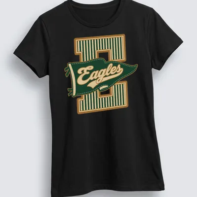 Retro pennant design featuring the word Eagles in green, gold, and cream — printed on a women's shirt