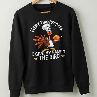 Colorful cartoon of a turkey chef with humor for Thanksgiving — printed on a unisex sweatshirt