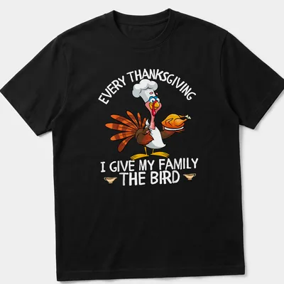 Colorful cartoon of a turkey chef with humor for Thanksgiving — printed on a unisex t-shirt