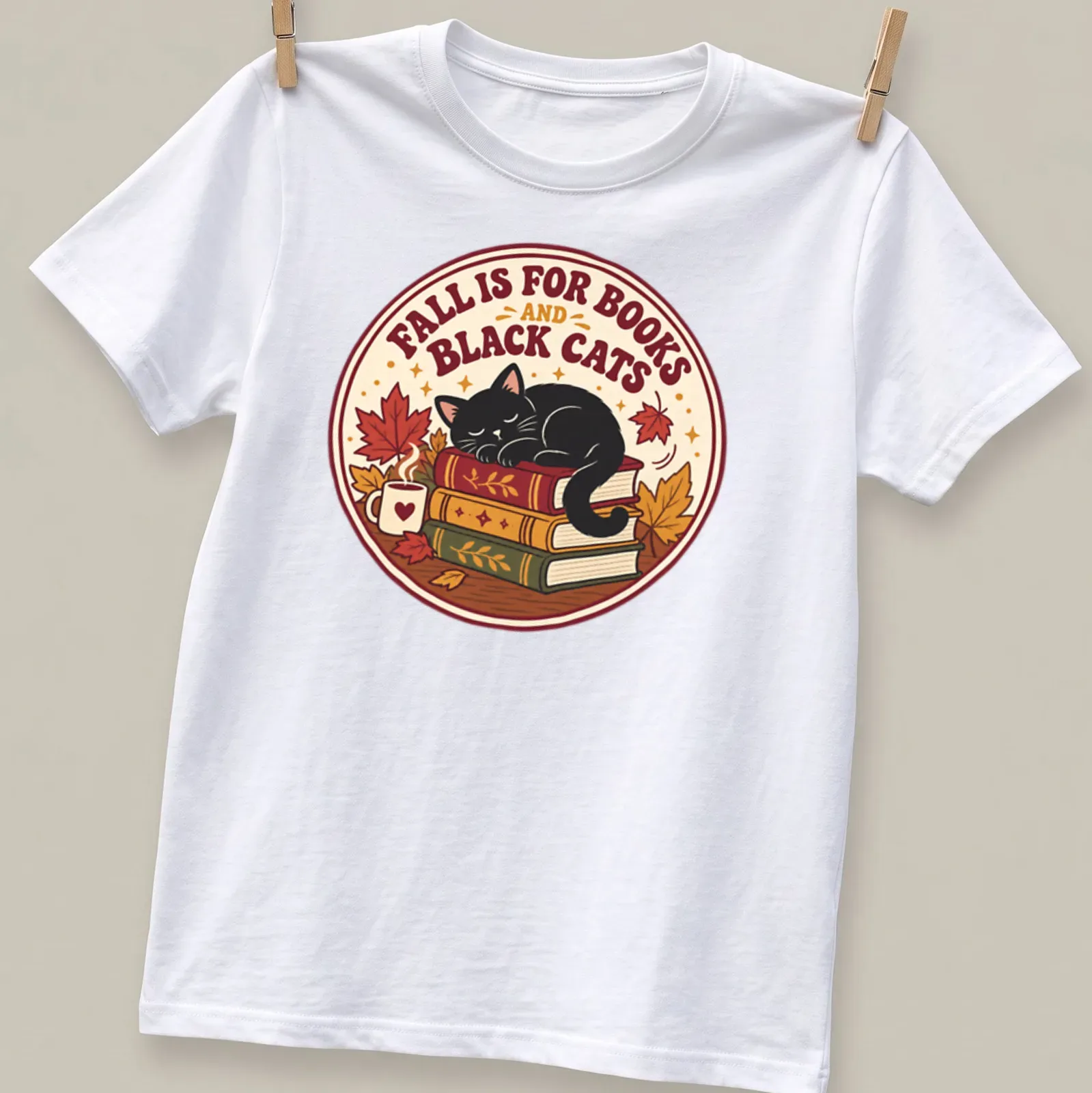 Vintage design of a sleeping black cat on a stack of books, featuring warm autumn colors. — printed on a unisex t-shirt