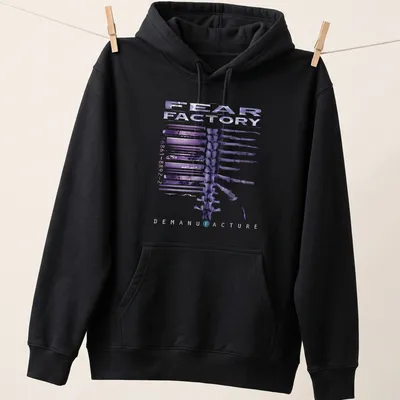 Abstract skeletal design with Fear Factory text in purple, black, and white — printed on a unisex hoodie