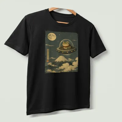 Japanese art style frog UFO pilot graphic on a — printed on a unisex t-shirt (angled view)