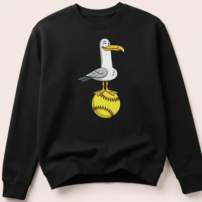 Cartoon seagull winking on a bright yellow softball — printed on a unisex sweatshirt
