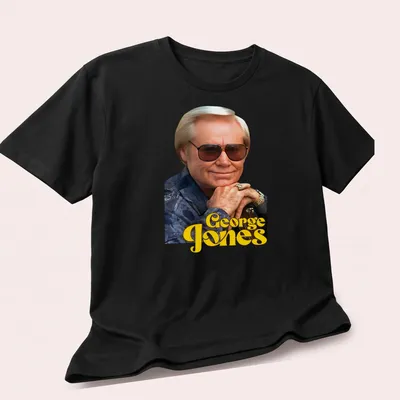 Vintage style George Jones T-shirt featuring a classic country music design — printed on a unisex t-shirt (angled view)