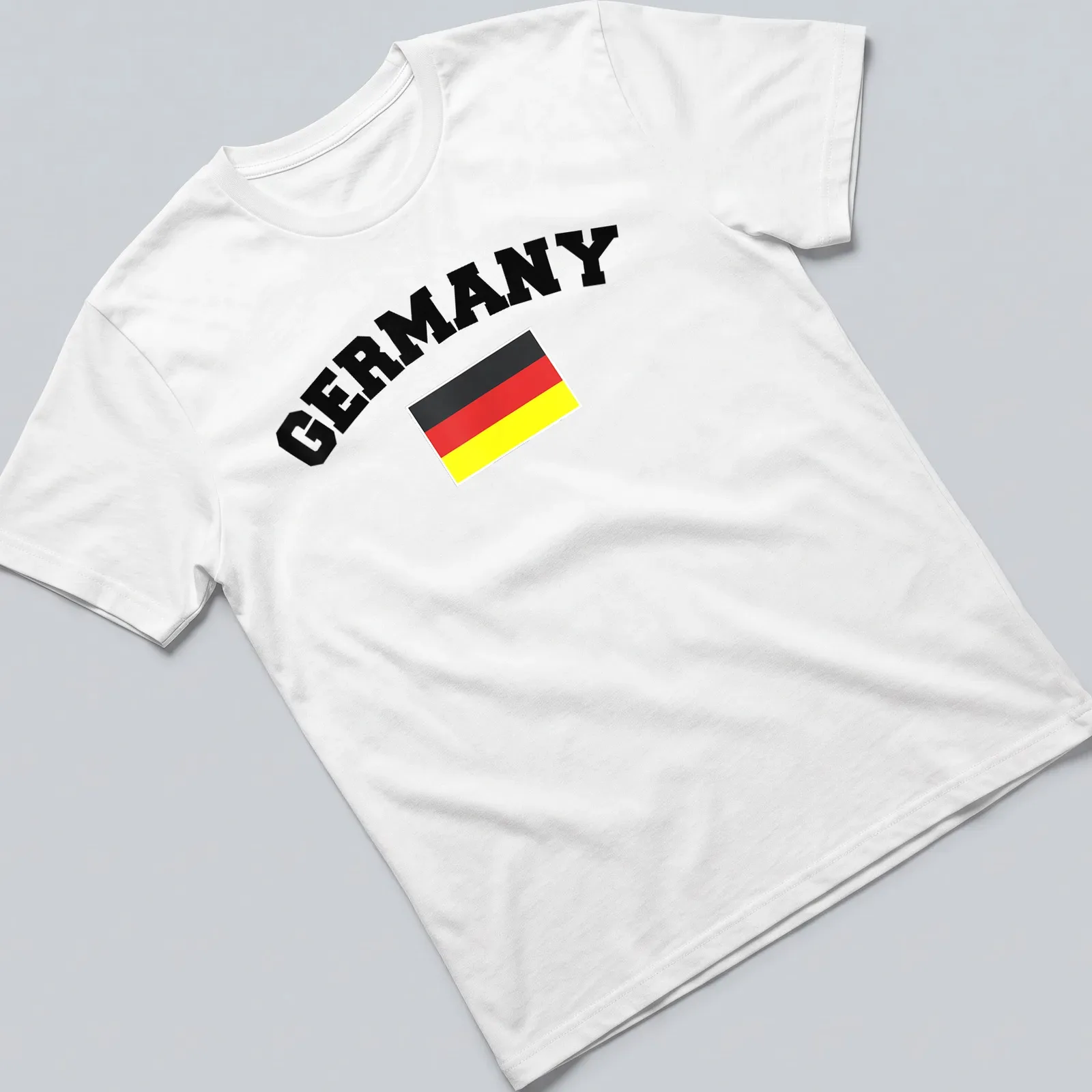Bold typography T-shirt with Germany flag colors: black, red, yellow — printed on a unisex t-shirt