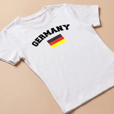 Bold typography T-shirt with Germany flag colors: black, red, yellow — printed on a women's shirt