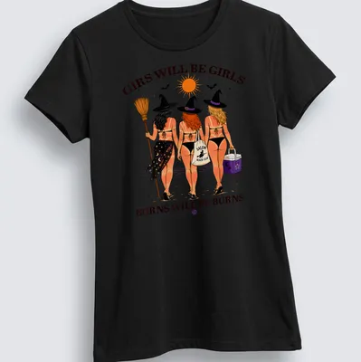 Colorful cartoon of three witches at the beach with playful text — printed on a women's shirt
