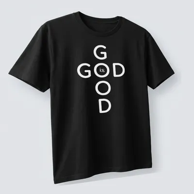 Bold typography T-shirt displaying 'God Is Good' Christian message in black and white — printed on a unisex t-shirt (angled view)