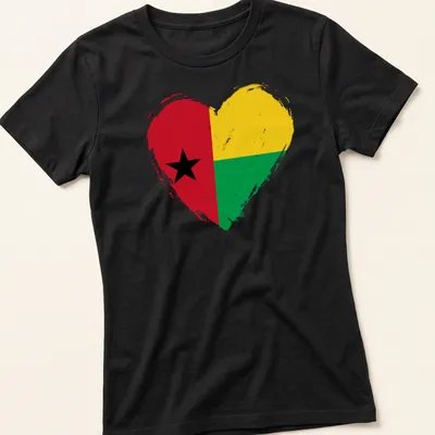 Distressed print of the Guinea Bissau flag in a heart shape with red, yellow, green, and black colors — printed on a women's shirt